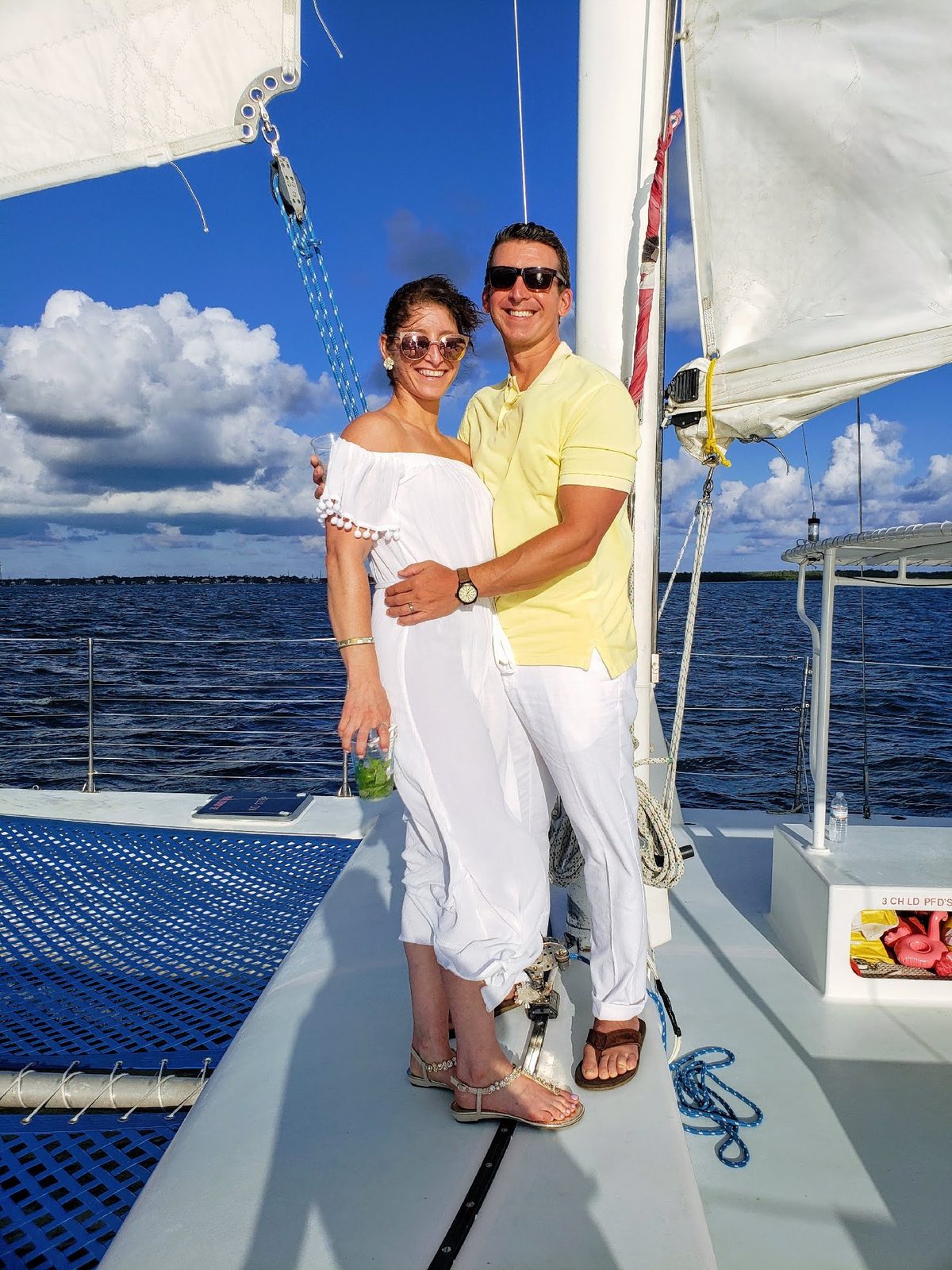 A newlywed couple at sunset on a Key Largo beach near the Carolina Moon