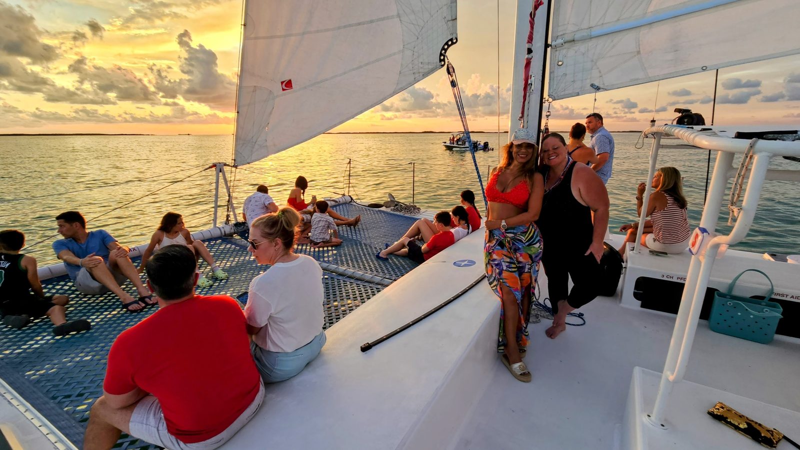 A group raising glasses to celebrate a birthday on a private Key Largo sail