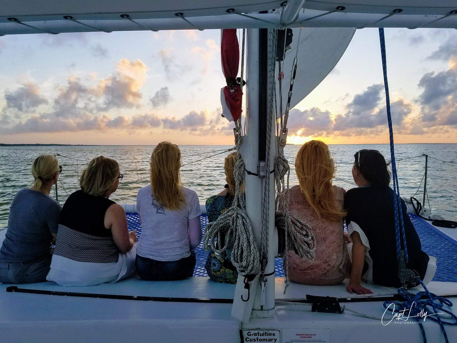 A fiery Key Largo sunset reflected across the calm surface of Florida Bay